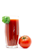 Tomato juice in a glass with green leaf with tomato near isolated on white background