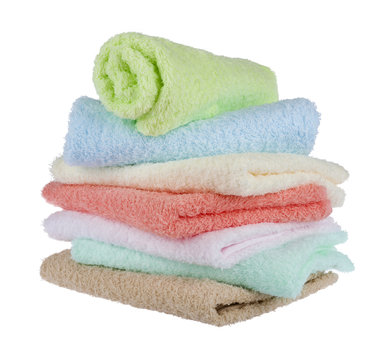 Colourful towel stack isolated on white background