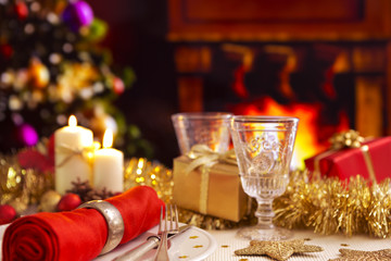 Naklejka na ściany i meble Christmas table with a fireplace and Christmas tree