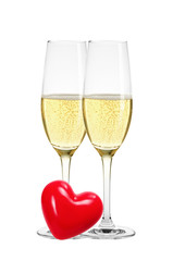 Two glasses of champagne and red heart isolated on white backgro