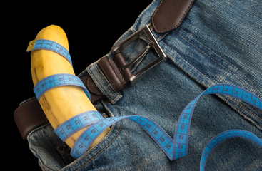 Big Banana like the penis in the men's jeans, centimeter