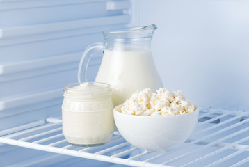 tasty dairy products: sour cream, cottage cheese, milk