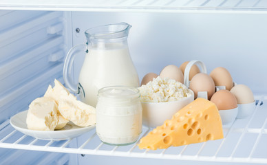 eggs and tasty dairy products: sour cream, cottage cheese, milk,