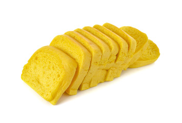 stack of sliced pumpkins bread on white background