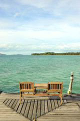 Chair on Wooden pier on summer season - Wooden pier in Kho mak,
