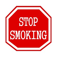 Stop smoking white stamp text on red octagon