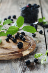 Fresh sweet blackberry on the wooden table