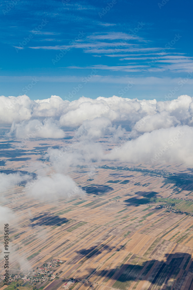 Wall mural aerial view of the village landscape near pinczow town over clo