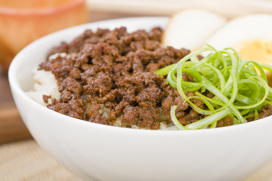 Lu Rou Fan (Taiwanese Braised Pork Rice Bowl) - Ground pork marinated and boiled in soy sauce served on top of steamed rice.

