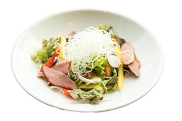  Salad with arugula and duck breast.