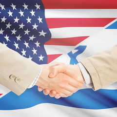 Businessmen handshake - United States and Israel