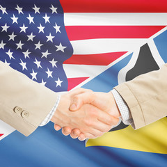 Businessmen handshake - United States and Saint Lucia