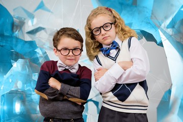 Composite image of cute pupils looking at camera