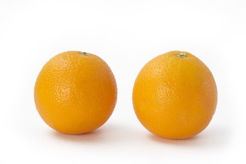 Two oranges isolated on white background