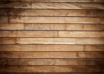 wooden planks background with sporlight and black vignette borde