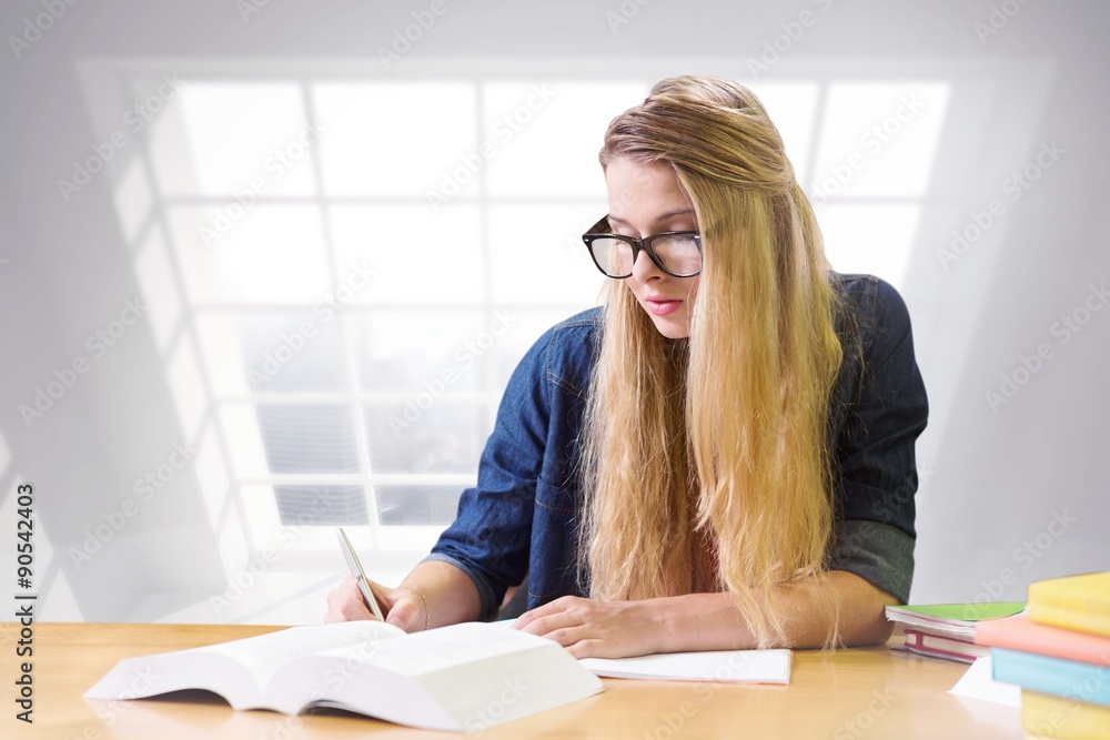 Poster composite image of student studying in the library