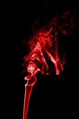Smoke red on a black background.