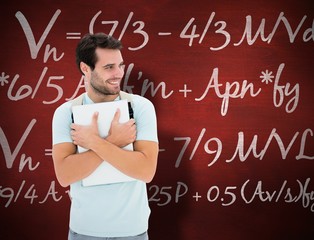 Composite image of student holding laptop