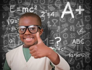 Composite image of cute pupil with thumbs up