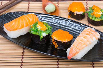 sushi in black dish