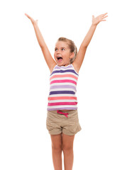 cute little girl standing on white stretching her arms up