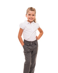 cheerful little girl wearing white t-shirt and pants isolated on
