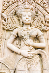 Apsara carvings statue on the wall of Cambodian art