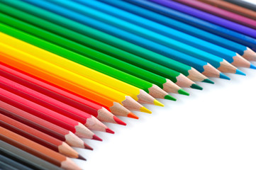 Colour pencils isolated on white background close up