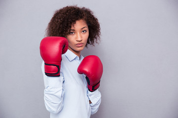 Afro american woman in boxing gloves