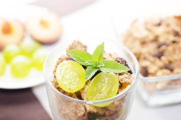 Detail of mint, grapes in a glass