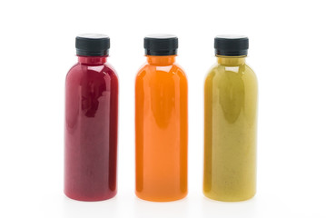 Fruit and vegetable juice bottles isolated on white background