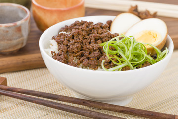 Lu Rou Fan (Taiwanese Braised Pork Rice Bowl) - Ground pork marinated and boiled in soy sauce served on top of steamed rice.
