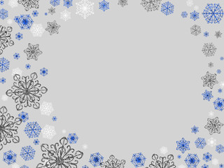 Winter background design - glittery snowflakes in blue, white and silver