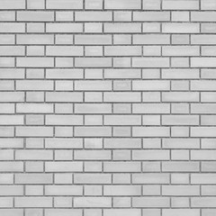 White brick stone wall seamless background and texture