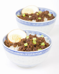 Lu Rou Fan (Taiwanese Braised Pork Rice Bowl) - Ground pork marinated and boiled in soy sauce served on top of steamed rice.
