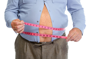 Fat man belly with measuring tape.