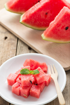 Fresh watermelon on white plate.