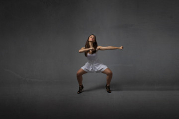 Fototapeta na wymiar girl in a martial arts pose