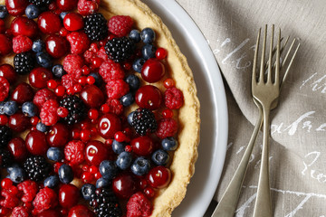 Sweet tart with raspberries, blueberries, blackberries, cherries