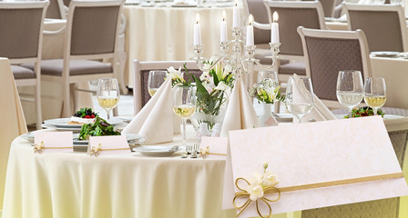 Exquisitely decorated table with invitation cards