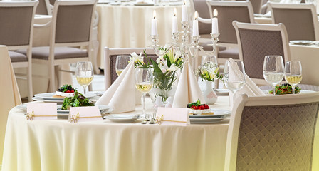 Exquisitely decorated table with invitation cards