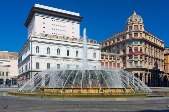 Panoramic view of De Ferrari square in Genoa, the heart of the city with the central fountain