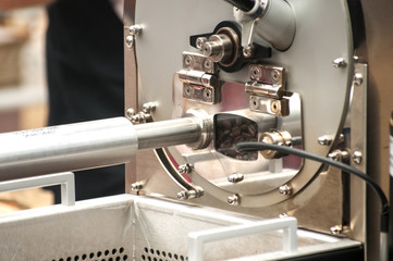 Professional machine for grinding coffee beans closeup