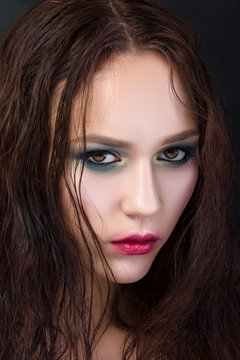 Beauty portrait of young girl with fashion make-up