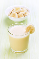 Milkshake with banana in glass