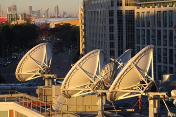 Parabolic satellite dish space technology receivers over the cit