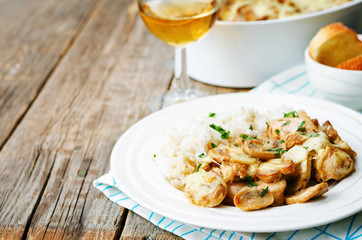 chicken baked with mushrooms and cheese with rice