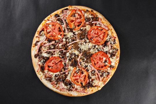 Hot tasty delicious rustic homemade american pizza with thick crust