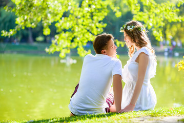 happy young couple enjoying vacation at the lake.