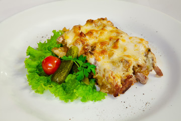 meat casserole with tomatoes and cucumbers